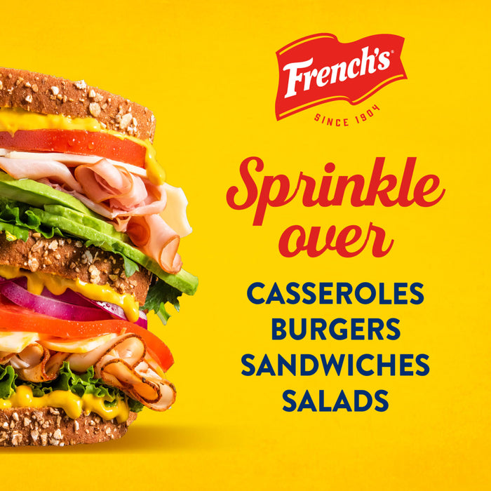 A sandwich with mustard and other toppings is shown with the French's brand logo and the text 'Sprinkle over casseroles, burgers, sandwiches, salads.'