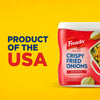 ["A red and blue can of French's Crispy Fried Onions on a yellow background."]