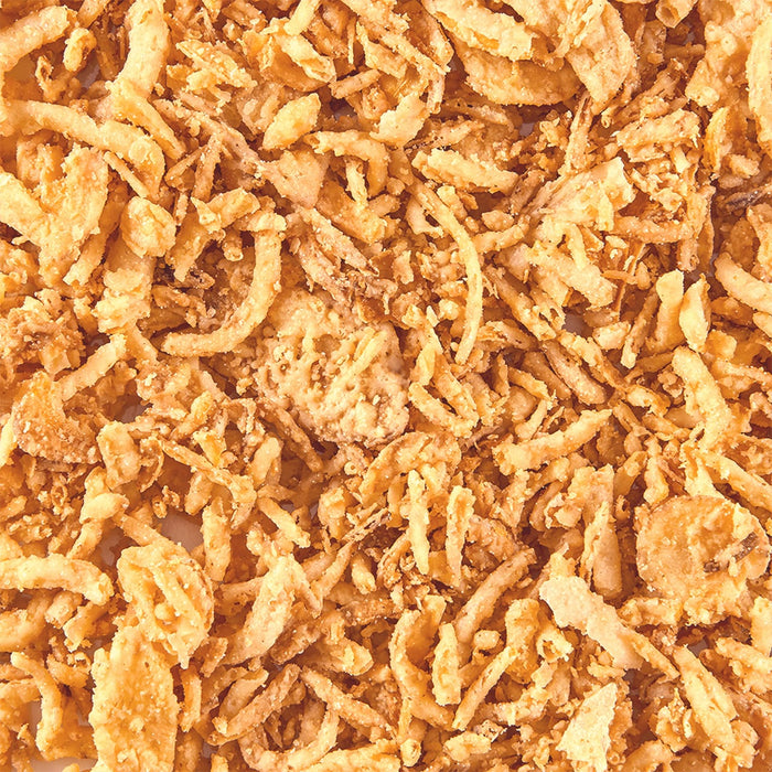 ['A close-up of crispy fried onions.']