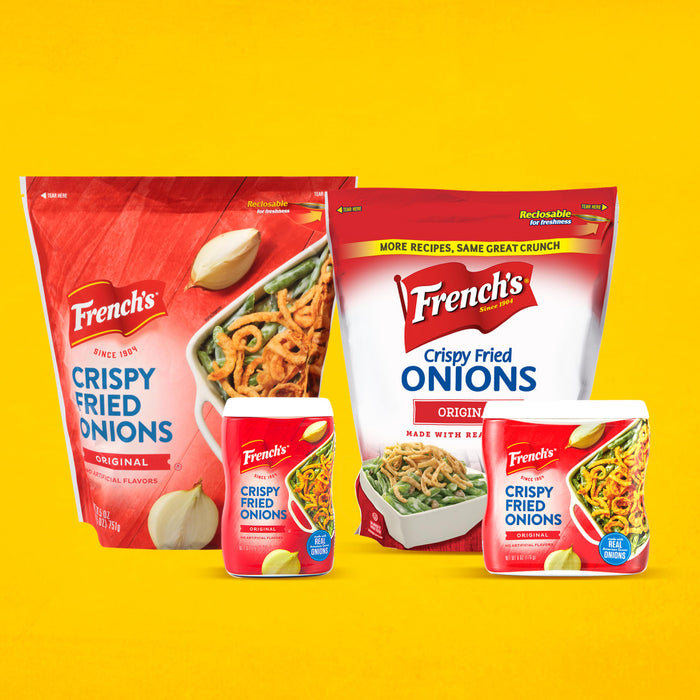 ["Four different packages of French's Crispy Fried Onions, including a bag, a can, and two boxes."]