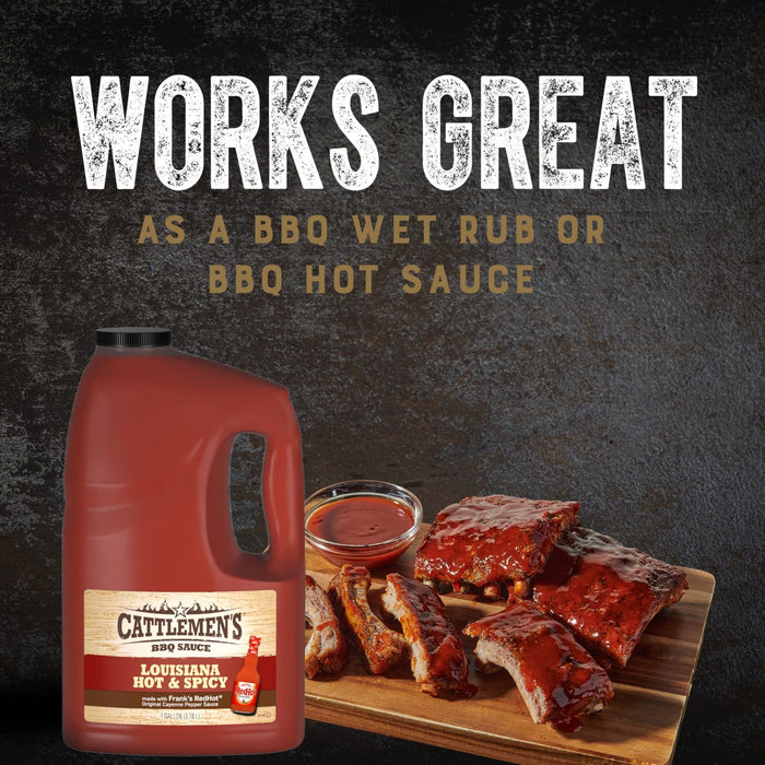 ["A gallon jug of Cattlemen's Louisiana Hot &amp; Spicy BBQ Sauce next to a plate of ribs."]