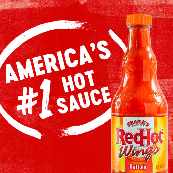 A bottle of Franks RedHot Wings Buffalo sauce with a white circle around it that says Americas #1 Hot Sauce.