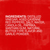 A red background with white text listing the ingredients for a product.