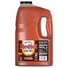 ["A gallon jug of Frank's RedHot Xtra Hot Cayenne Pepper Sauce."]