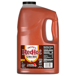 ["A gallon jug of Frank's RedHot Xtra Hot Cayenne Pepper Sauce."]