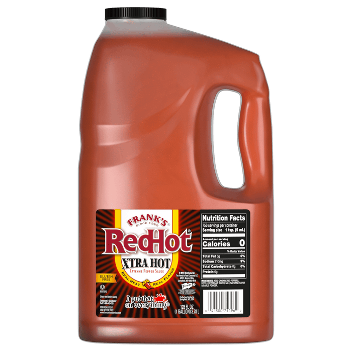 ["A gallon jug of Frank's RedHot Xtra Hot Cayenne Pepper Sauce."]