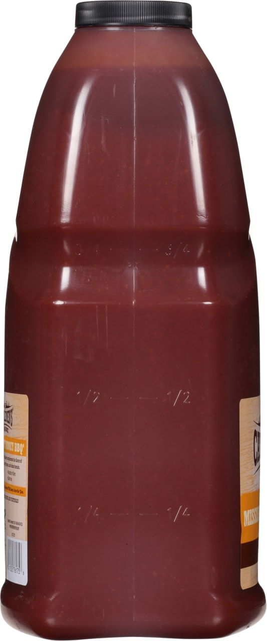 ["A plastic bottle of  Chef's  Honey BBQ sauce."]