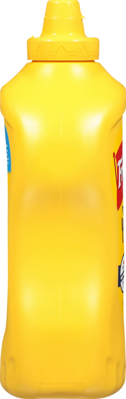 ["A yellow plastic bottle of French's Yellow Mustard."]
