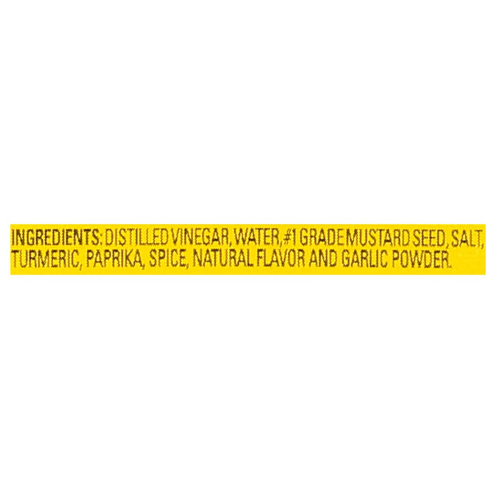 ['A yellow label with the ingredients for a mustard product.']