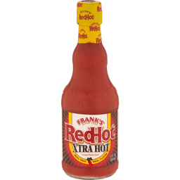 A bottle of Frank's RedHot XTRA Hot Cayenne Pepper Sauce.