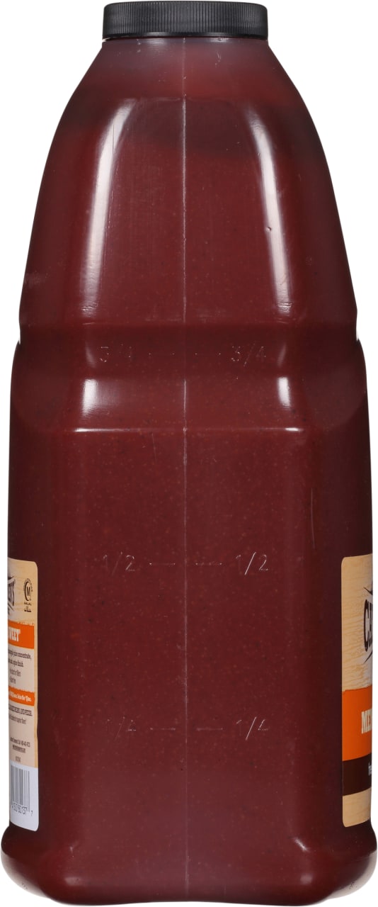 ["A plastic bottle of Sweet Baby Ray's barbecue sauce."]