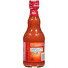 A bottle of Franks RedHot Original hot sauce with a recipe for Buffalo Chicken Dip on the label.