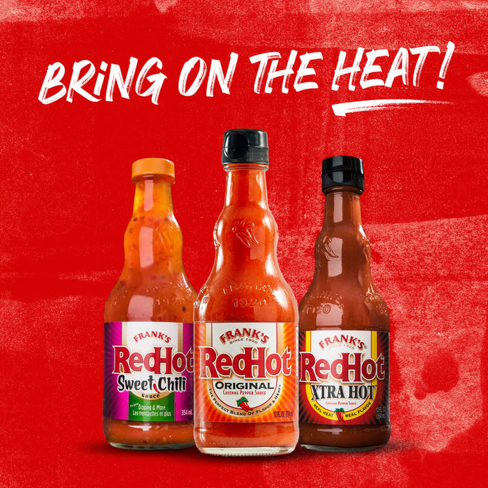 Three bottles of Franks RedHot sauce, Sweet Chili, Original, and Extra Hot.