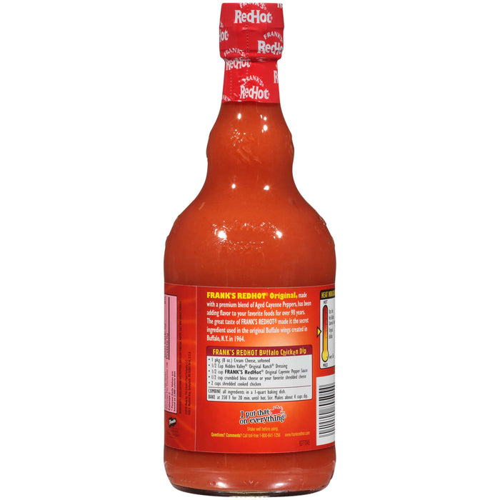 ["A bottle of Frank's RedHot Original hot sauce with a recipe for Buffalo Chicken Dip on the label."]