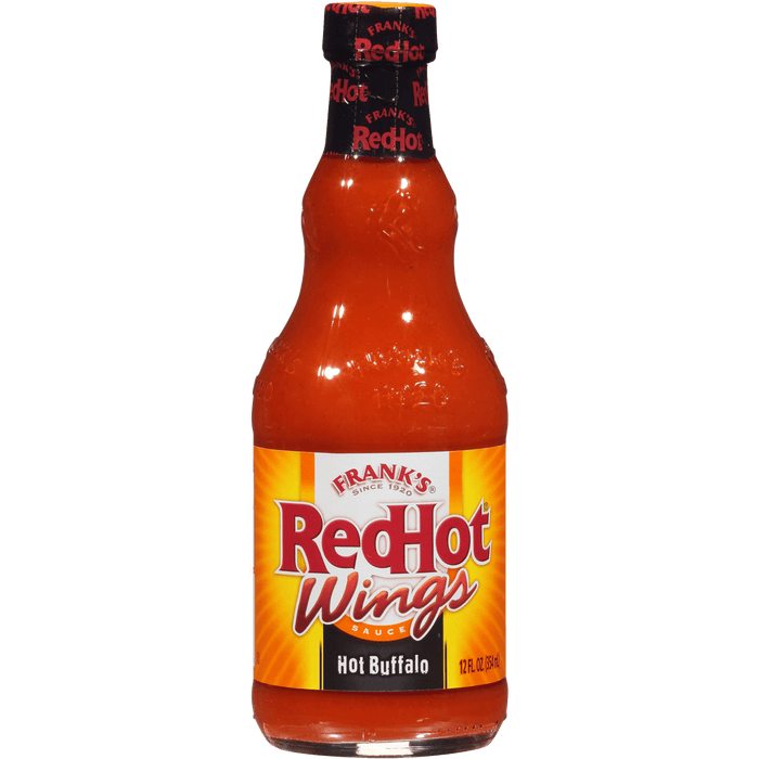 A bottle of Frank's RedHot Wings Hot Buffalo Sauce.