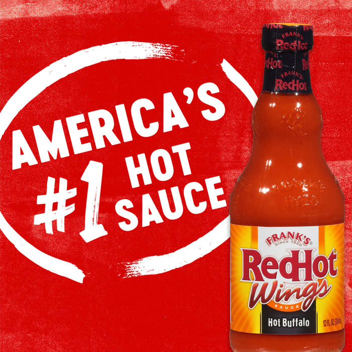 ["A bottle of Frank's RedHot Wings hot sauce with a red background that says America's #1 Hot Sauce."]