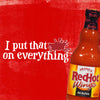 A bottle of Frank\'s RedHot Wings Hot Buffalo Sauce with the tagline I put that on everything.
