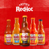 ["Five bottles of Frank's RedHot Wings Sauce in different flavors."]