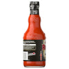 The back of a glass bottle of Franks Red Hot Buffalo Wing Hot Sauce Hot 12 Oz displays the recipe for Hot Buffalo Wings and the slogan, I put that on everything.