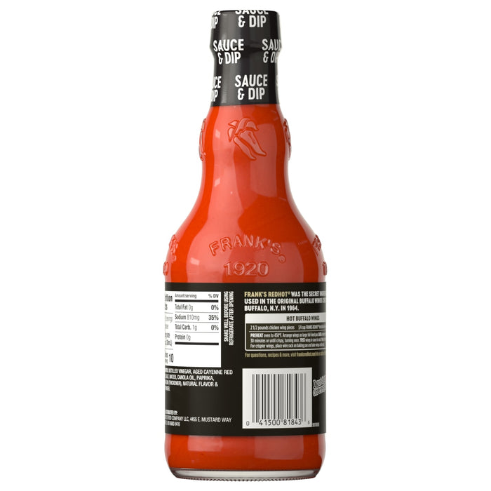 The back of a glass bottle of Franks Red Hot Buffalo Wing Hot Sauce Hot 12 Oz is shown, detailing the nutrition facts, ingredients, and a recipe for Hot Buffalo Wings.