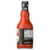 A back view of a bottle of Franks Red Hot Buffalo Wing Hot Sauce Hot 12 Oz displays the nutrition facts and ingredients list against a white background.
