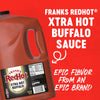 A gallon jug of Franks RedHot Xtra Hot Buffalo Sauce.