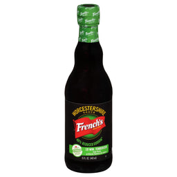 ["A bottle of French's Worcestershire Sauce with a green label and a red logo."]