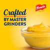 Frenchs mustard in a bowl with the text Crafted by Master Grinders on a yellow background.
