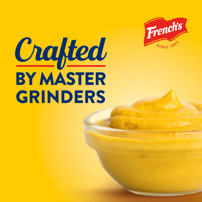 Frenchs mustard in a bowl with the text Crafted by Master Grinders on a yellow background.