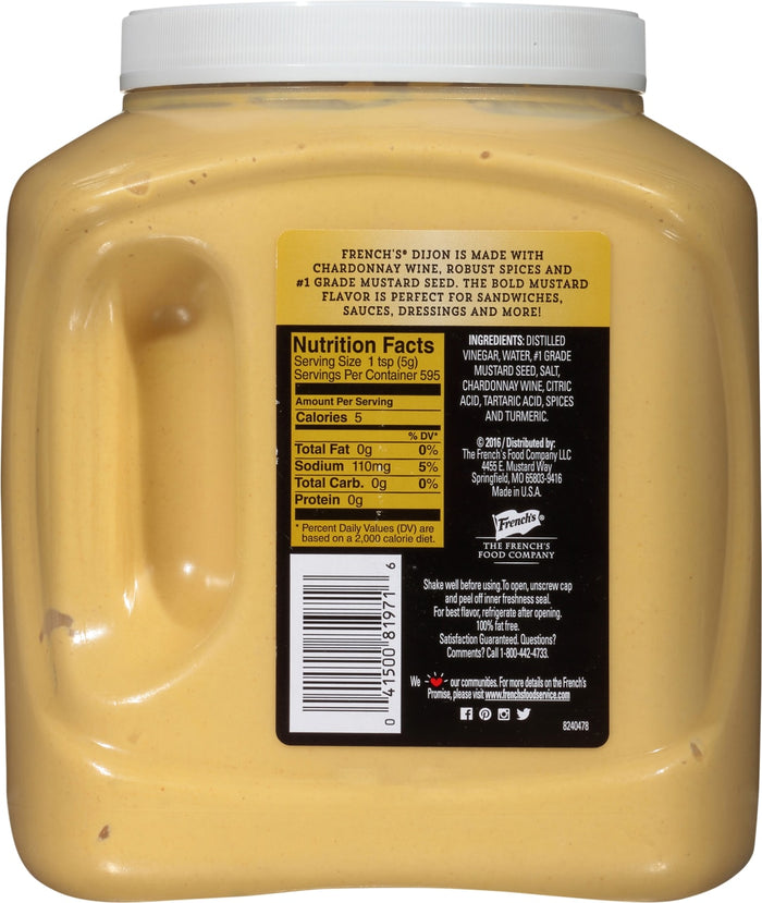 A jar of Frenchs Dijon Mustard with nutrition facts and ingredients listed on the label.