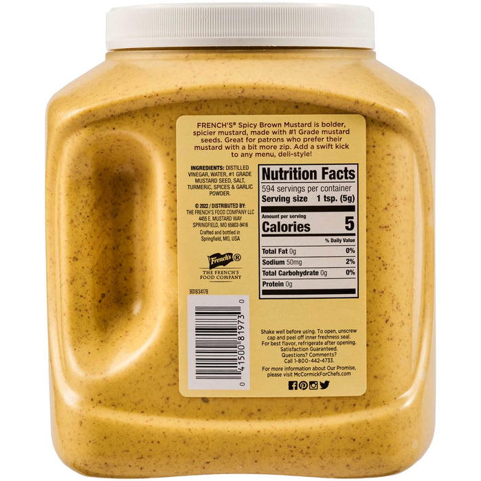 A container of Frenchs Spicy Brown Mustard with nutrition facts and ingredients listed on the label.