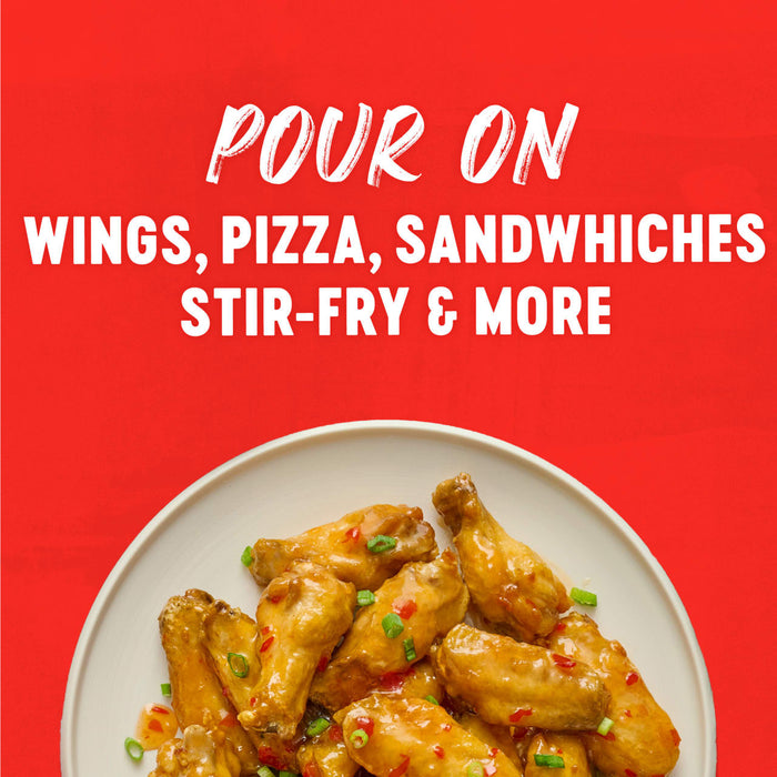 A plate of chicken wings with the text "Pour on wings, pizza, sandwiches, stir-fry &amp; more" on a red background.