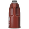 A side view of a large, 128-ounce jug of Franks Red Hot Garlic Regular Hot Sauce Regular 128 Oz, showing the dual-grip handle and nutrition label.