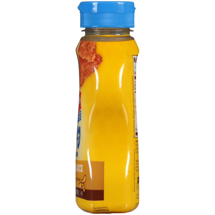 A bottle of French's Honey Mustard Sauce.