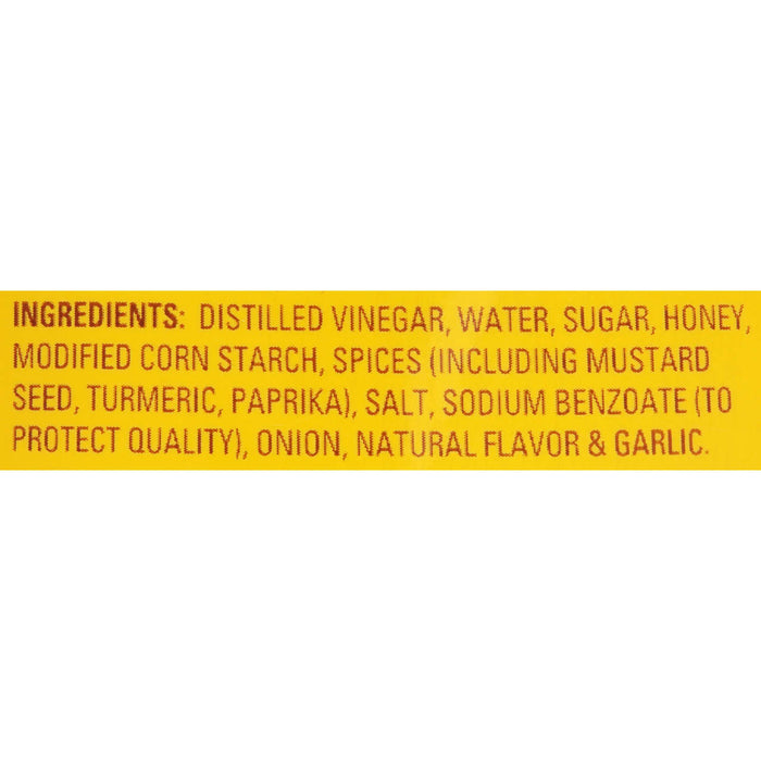 A list of ingredients for a product, including distilled vinegar, water, sugar, honey, modified corn starch, spices, salt, sodium benzoate, onion, and natural flavor.
