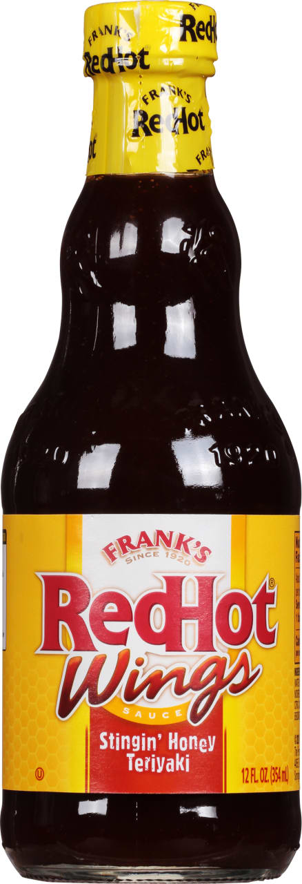 A bottle of Frank's RedHot Wings Sauce in Stingin' Honey Teriyaki flavor.