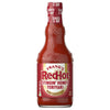A glass bottle of Franks Red Hot Stingin Honey Teriyaki Wing Hot Sauce Mild 12 Oz is shown against a white background.
