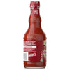The back of a glass bottle of Franks Red Hot Stingin Honey Teriyaki Wing Hot Sauce Mild 12 Oz shows the nutrition facts, a recipe for wings, and the brand's slogan, I put that on everything.