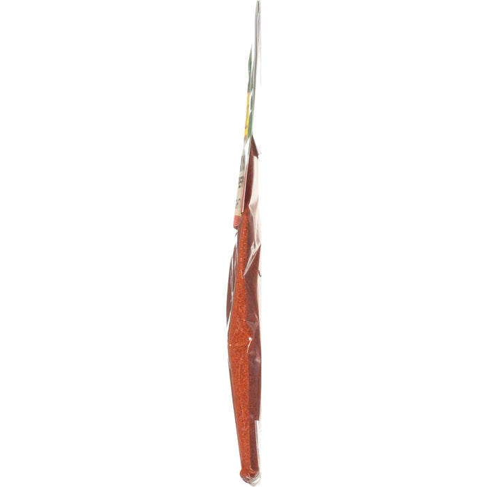 A side view of a small bag of McCormick Chili Powder.