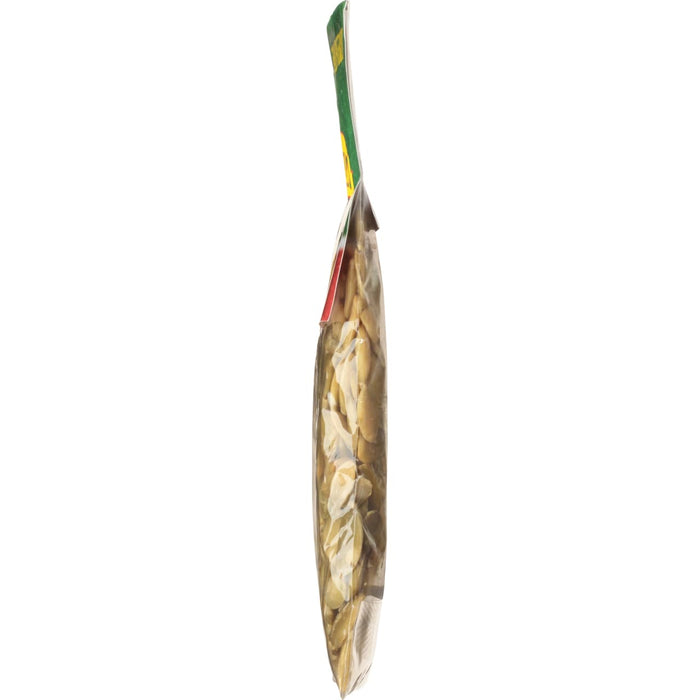 A side view of a bag of roasted pumpkin seeds.
