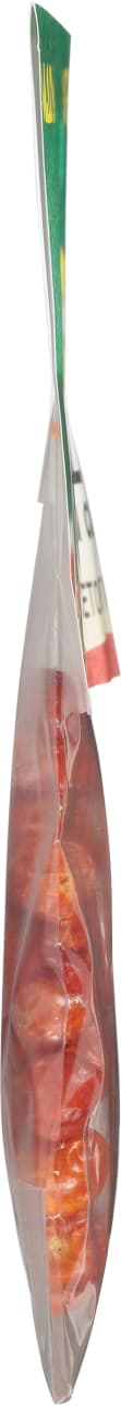 A clear plastic bag filled with red pepper slices.