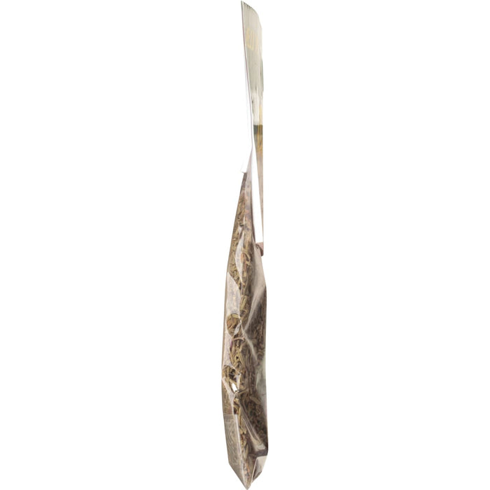 A side view of a clear plastic bag filled with dried herbs.