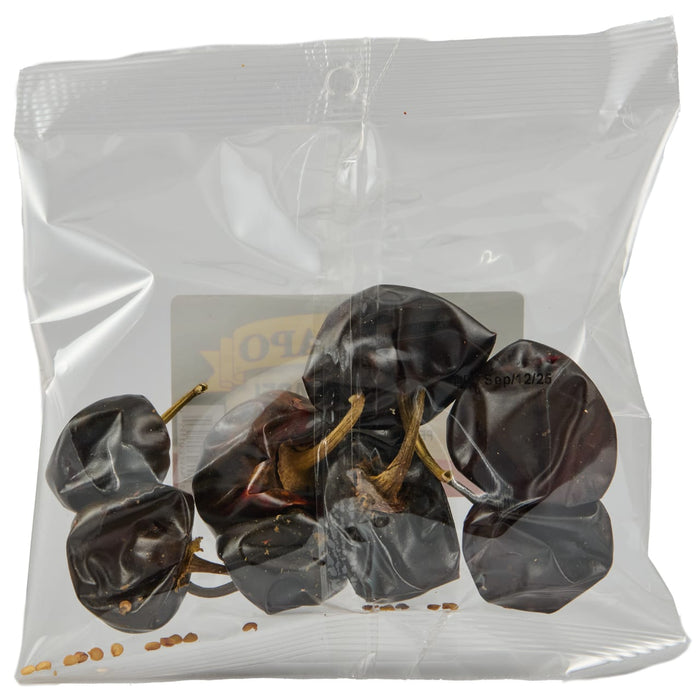A plastic bag of dried black peppers.