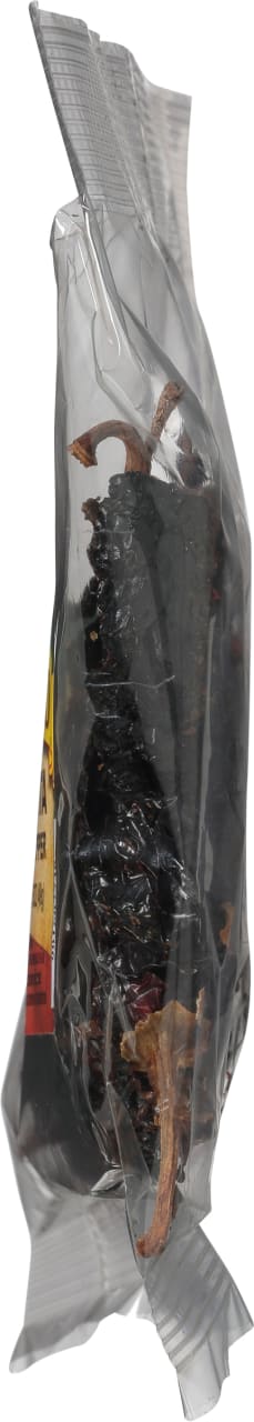 A close-up of a bag of dried black peppercorns.