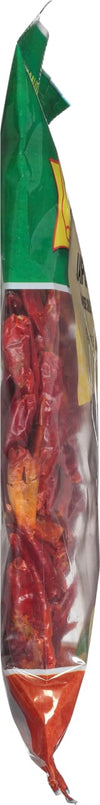 A close-up of a bag of dried red peppers.