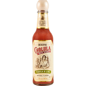 A bottle of Cholula Tequila &amp; Lime hot sauce.
