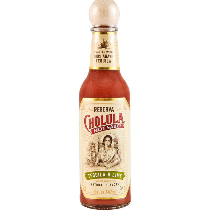 A bottle of Cholula Tequila &amp; Lime hot sauce.