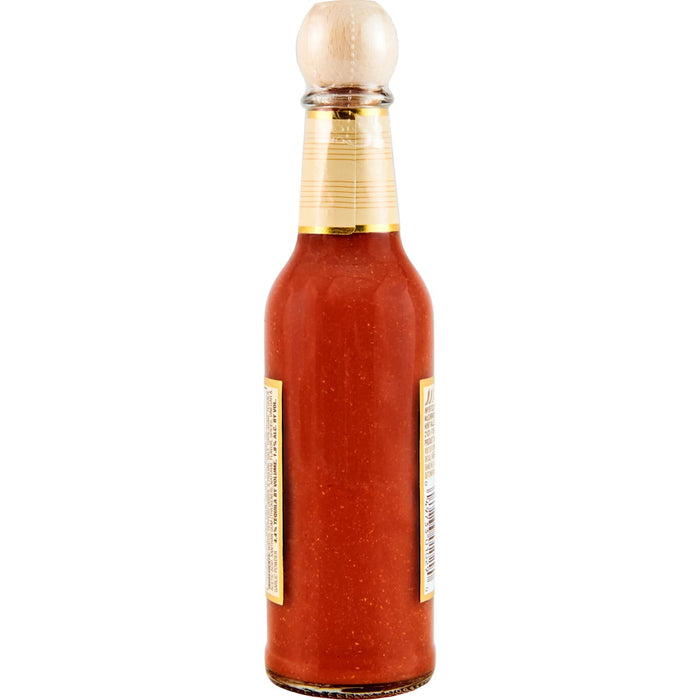 A bottle of McCormick Hunt's Valentina Hot Sauce.
