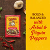 A packet of Cholula Medium Taco Seasoning Mix 1 Oz is displayed on a rustic wooden surface alongside fresh garlic and dried peppers to highlight its bold and balanced flavor profile.