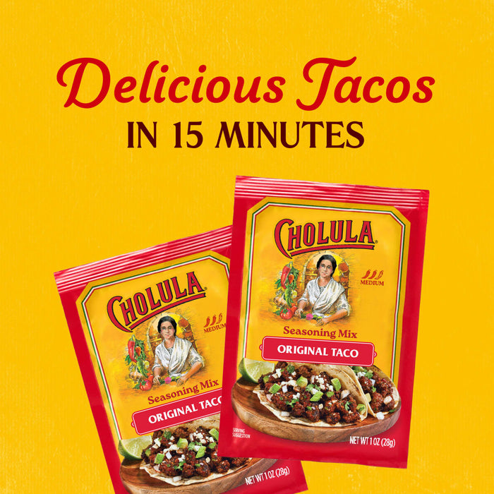 Two packets of Cholula Medium Taco Seasoning Mix 1 Oz are displayed against a bright yellow background with text promising delicious tacos in 15 minutes.